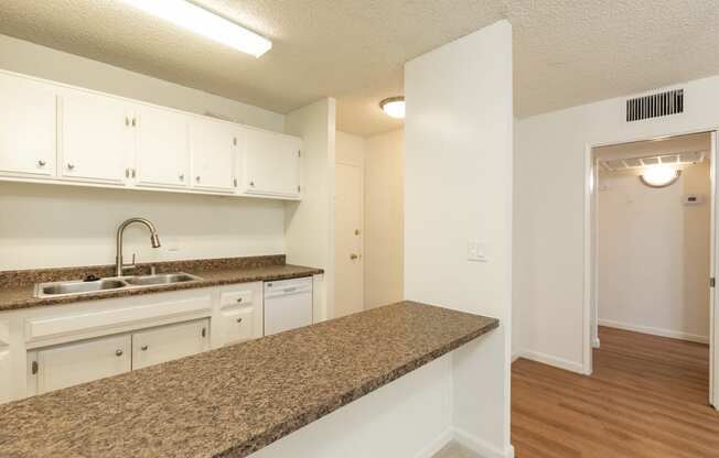 Kitchen with White Appliances and White Cabinets