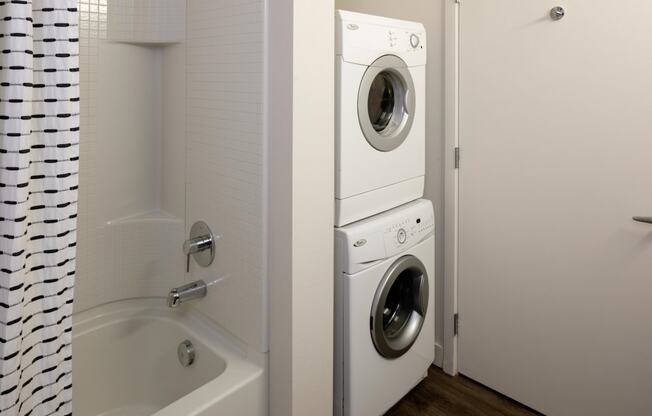 Savier Street Flats Model Bathroom with Washer and Dryer