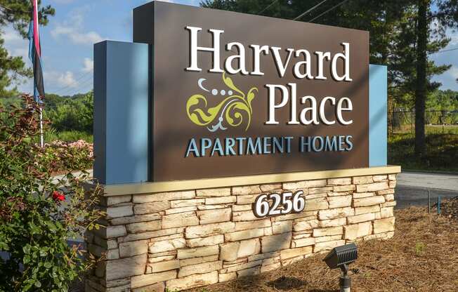 Sign board at Harvard Place Apartment Homes by ICER, Georgia, 30058