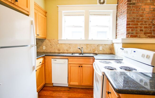 Stunning Top Floor 1-Bed with Exposed Brick + Old-World Charm!