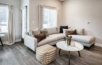 a living room with a couch and a coffee table