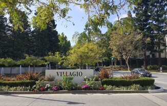 Rare Villagio 2 level townhome with garage and balcony, plus Den