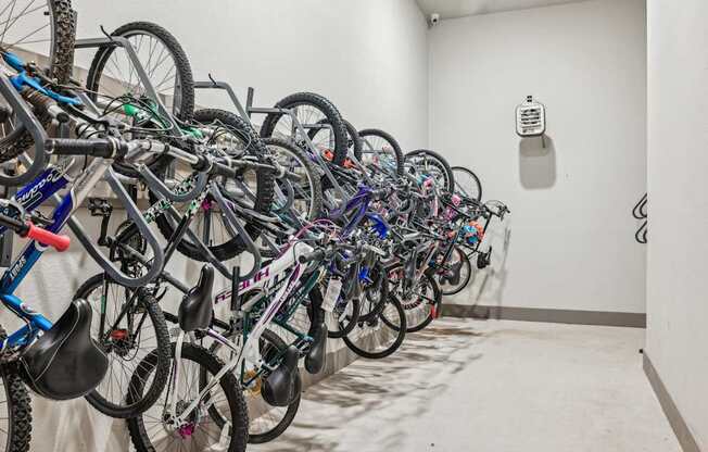 A room full of bicycles is shown.