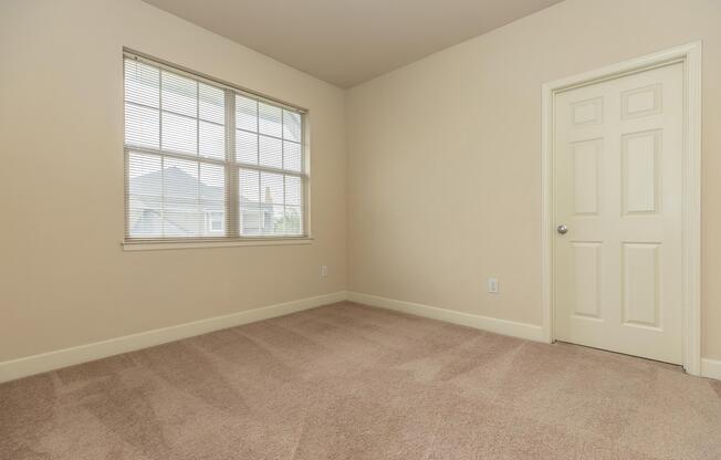 a room with a sink and a window