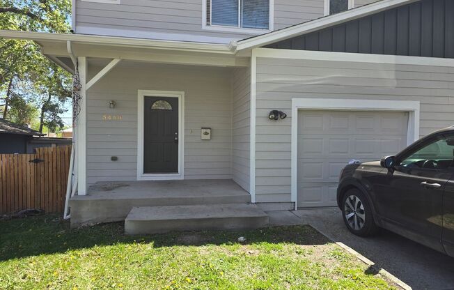 Three-bedroom condo in Denver boasts a large private yard and many additional features!