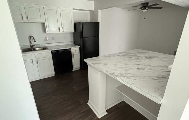 a view of the kitchen from the living room