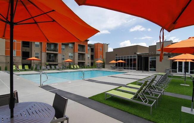 Swimming Pool Area With Shaded Chairs at Lofts at 7800 Apartments, Midvale, UT