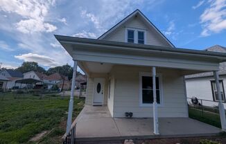 2-Bedroom Home with Fenced Yard, Off-Street Parking & Full Basement