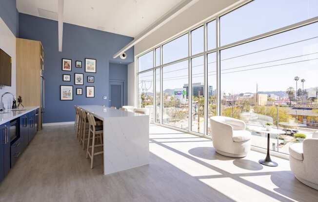 Expansive resident lounge overlooking the pool deck at The Chandler in North Hollywood