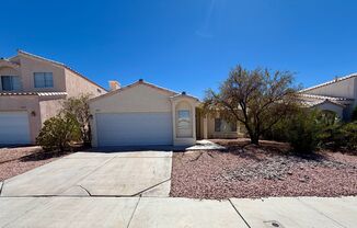 Single Story near Pecos and Windmill