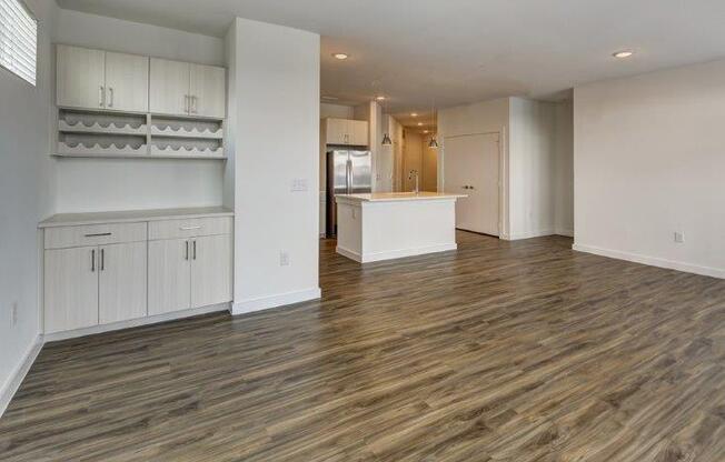living room with a view of the kitchen at Brixton South Shore, Texas, 78741