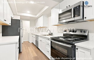 242 NE 25 AVE