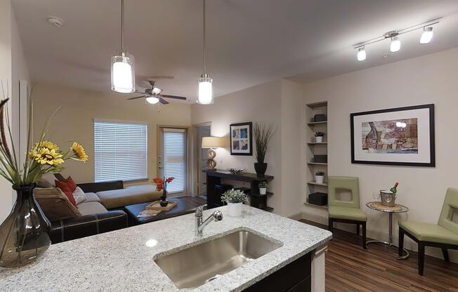 a living room filled with furniture and a flat screen tv