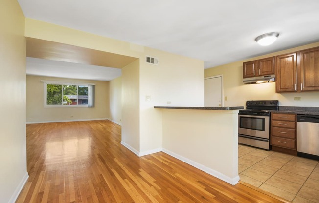 Spacious living room with hardwood flooring