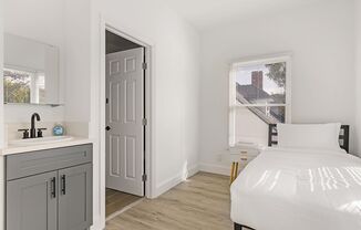 A 5 bedroom, 3 bathroom apartment with common areas and a fully functional kitchen at 1740 Kelton Ave.