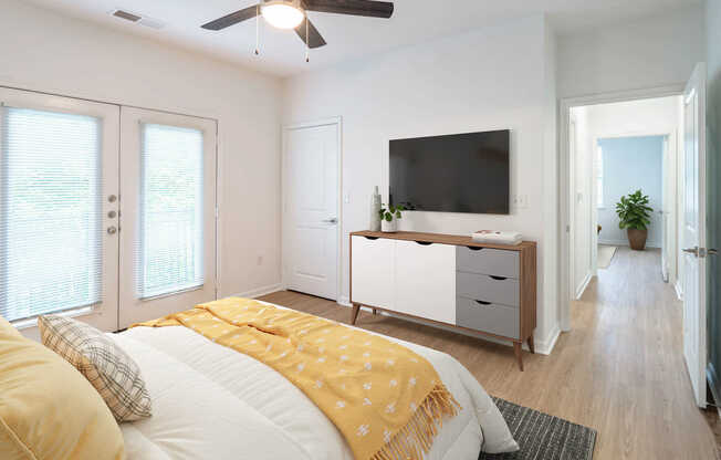 Bedroom with Balcony and Hard Surface Flooring