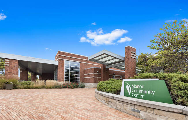 the front of a building with a sign for the morgan community center