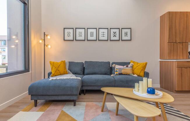 a living room filled with furniture and a fireplace