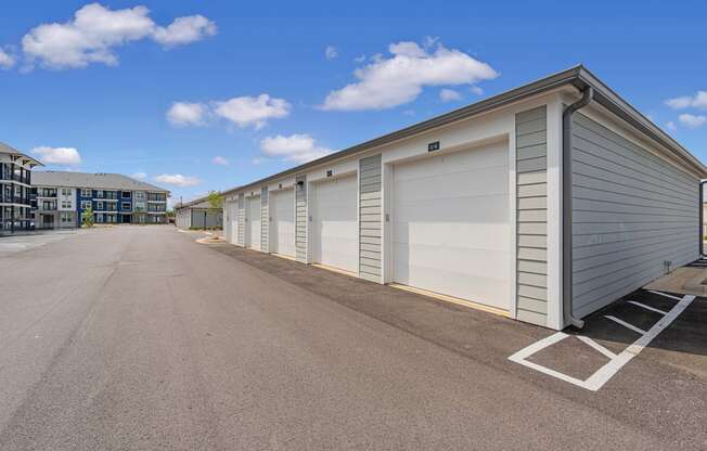 a row of garage doors on the side of a building