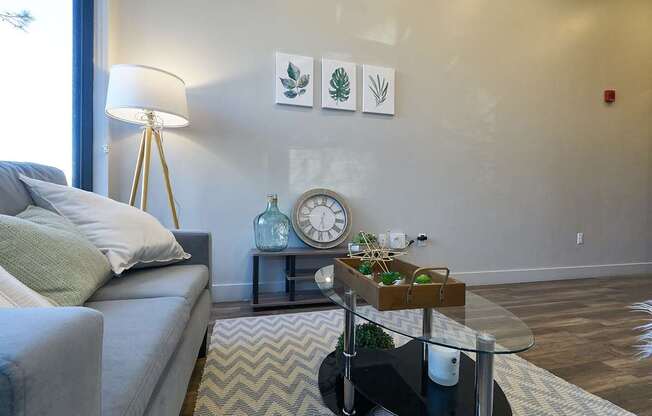 Living room with couch at Brickside Heights Apartments, Millcreek, UT, 84106