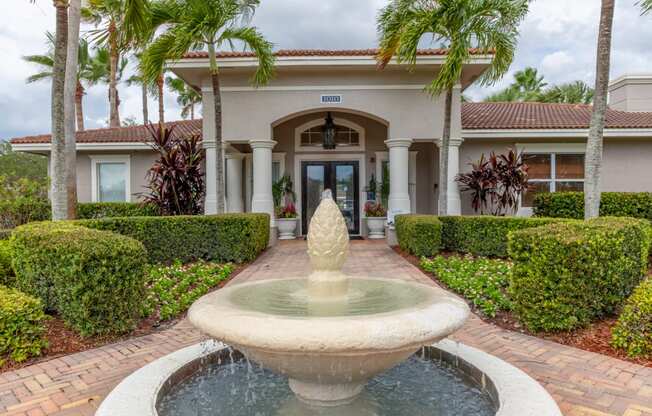 a fountain in front of a house at Heritage Bay, Jensen Beach, FL 34957