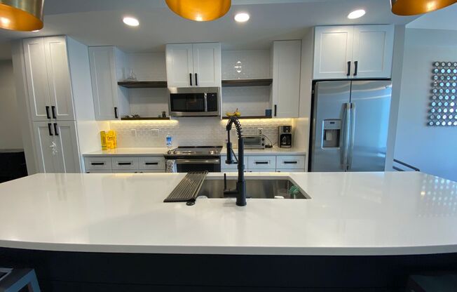 Modern 2 Bed | 3.5 Bath Townhome with Bonus Loft & Rooftop Deck!