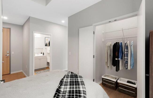 Bedroom with large closet and attached bathroom