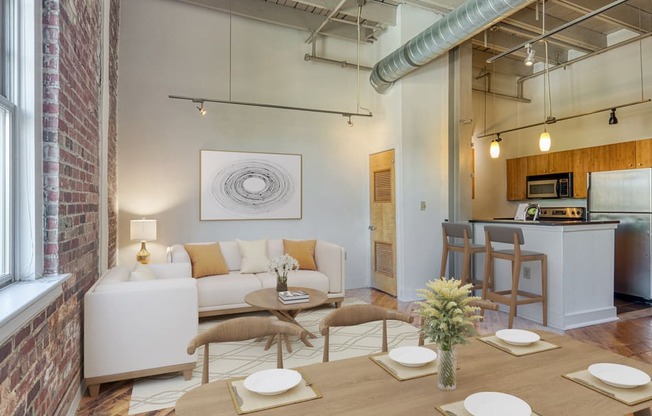 a living room with a couch and a table