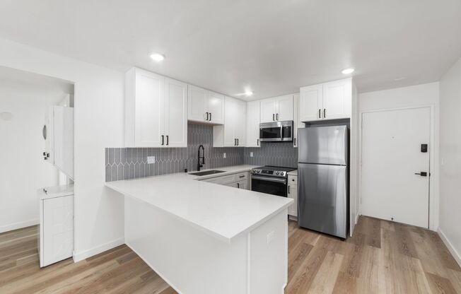 One Month FREE!! Beautiful renovations at this 2-bedroom, 1-bathroom with Private Balcony!!