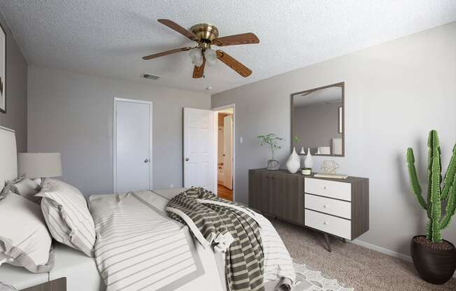 Bedroom with Ceiling Fan at The Villas at Quail Creek Apartment Homes in Austin Texas