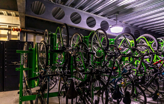 A bike parking area with many bikes.