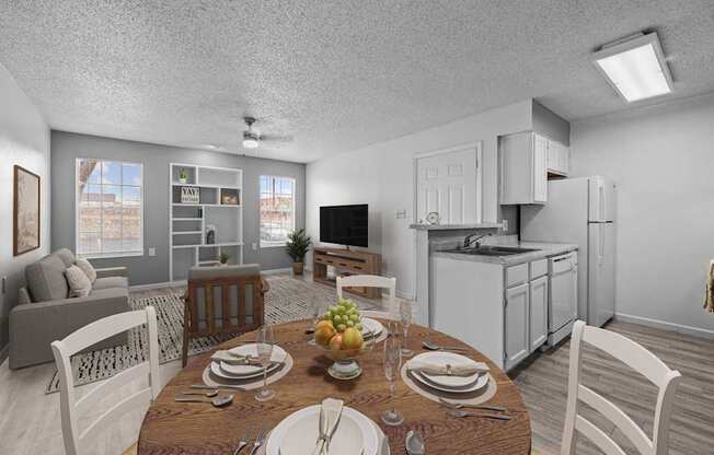 A dining room with a table set for a meal.