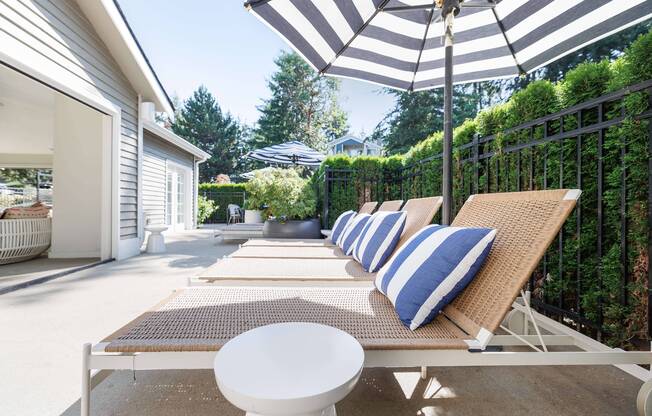 outdoor lounge chairs by pool