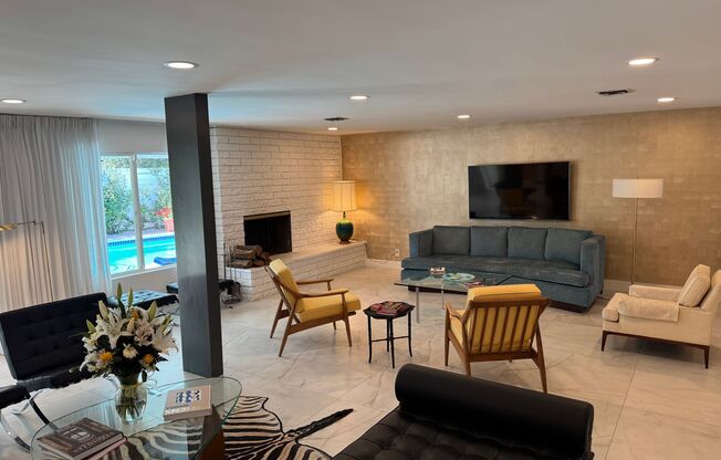 Mid-Century Modern Home at its finest. In ground pool and hot tub.