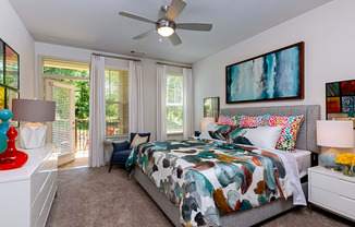 Bedroom with private patio access at Sycamore at Tyvola, Charlotte, North Carolina