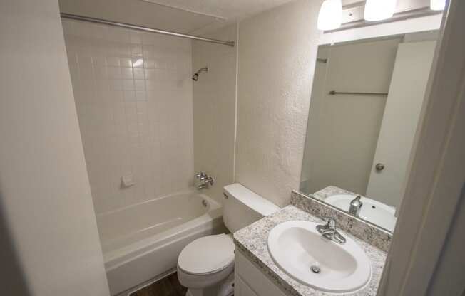 This is a photo of the bathroom of an upgraded 554 square foot 1 bedroom apartment at The Biltmore Apartments in Dallas, TX.