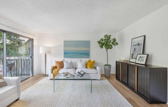 a living room with a couch and a coffee table