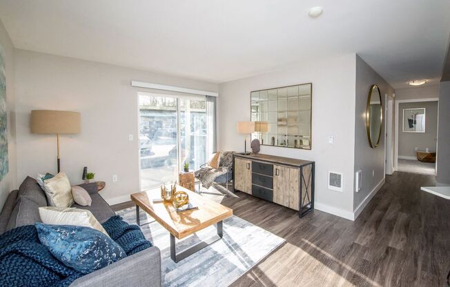 a living room with a couch and a coffee table
