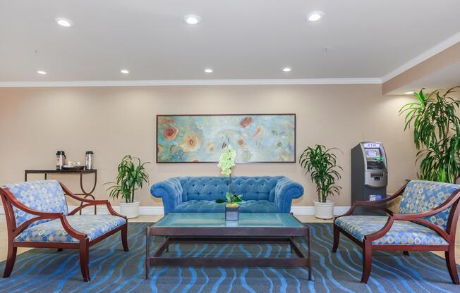 a living room filled with furniture and a large window