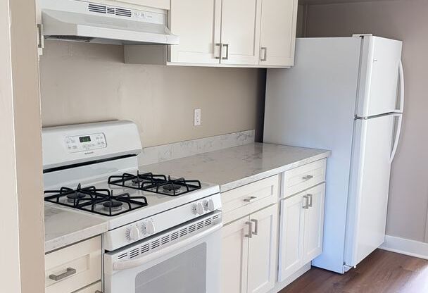 Bright Sunnyside Home with Fireplace, Bay Windows & Private Backyard!