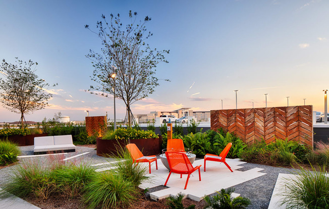 Chairs surrounding fire pit on amenity deck at Pixon at Lake Nona Pixon, Florida, 32827