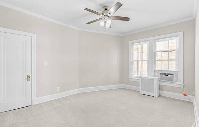Carpeted bedroom in Kew Gardens in Washington, DC 20007
