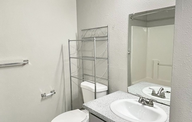 Downstairs Bathroom with Shower and Laundry Space