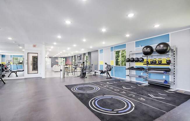the home has a workout room with weights and cardio equipment