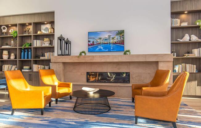 a living room filled with furniture and a fireplace