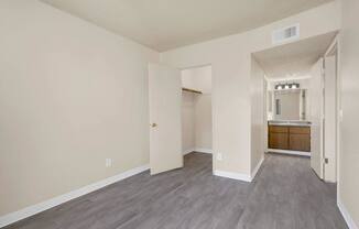 A room with a doorway leading to another room.
