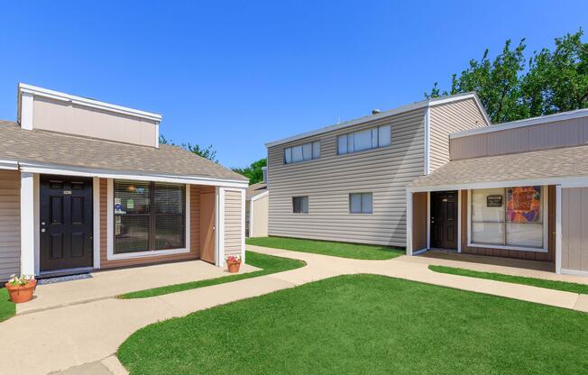 a large lawn in front of a house