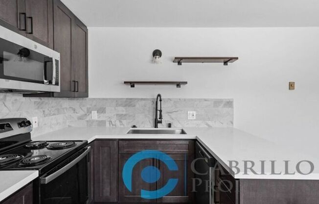 207 E 1 ST