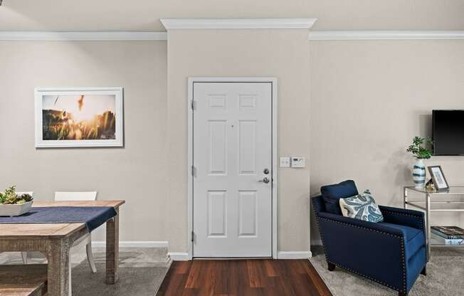 Wood-style flooring in entry foyers - Willow Spring Apartments