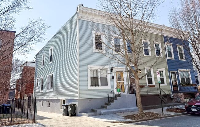 STUNNINGLY RENOVATED 5BR/2BA END UNIT ROW HOME.   WASHER/DRYER INCLUDED